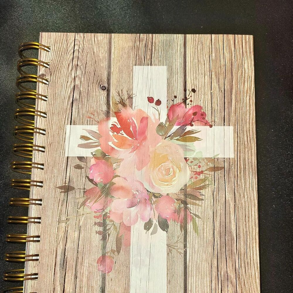 cross notebook with flowers